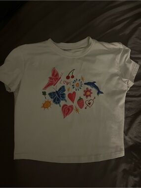 White Graphic Tee with Colorful Nature Motifs